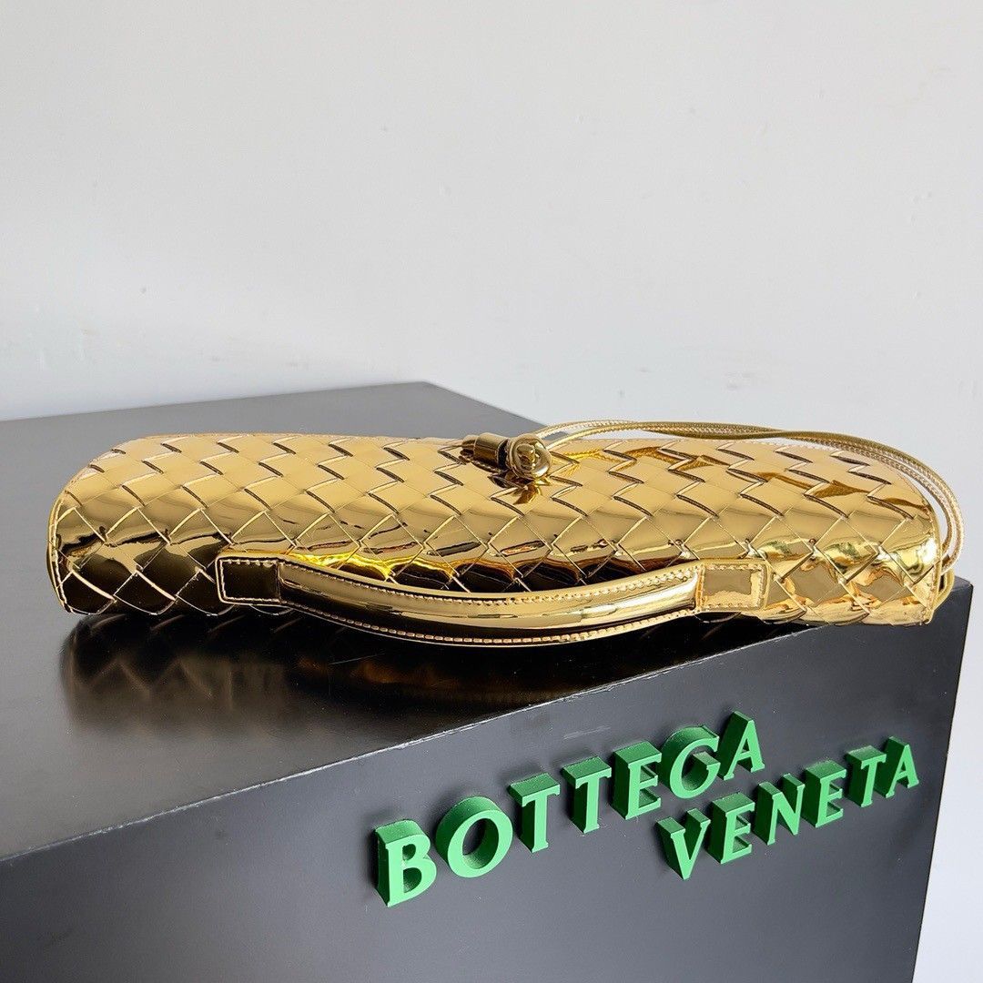 Bottega Veneta Andiamo Clutch with Handle in Gold Metallic Leather