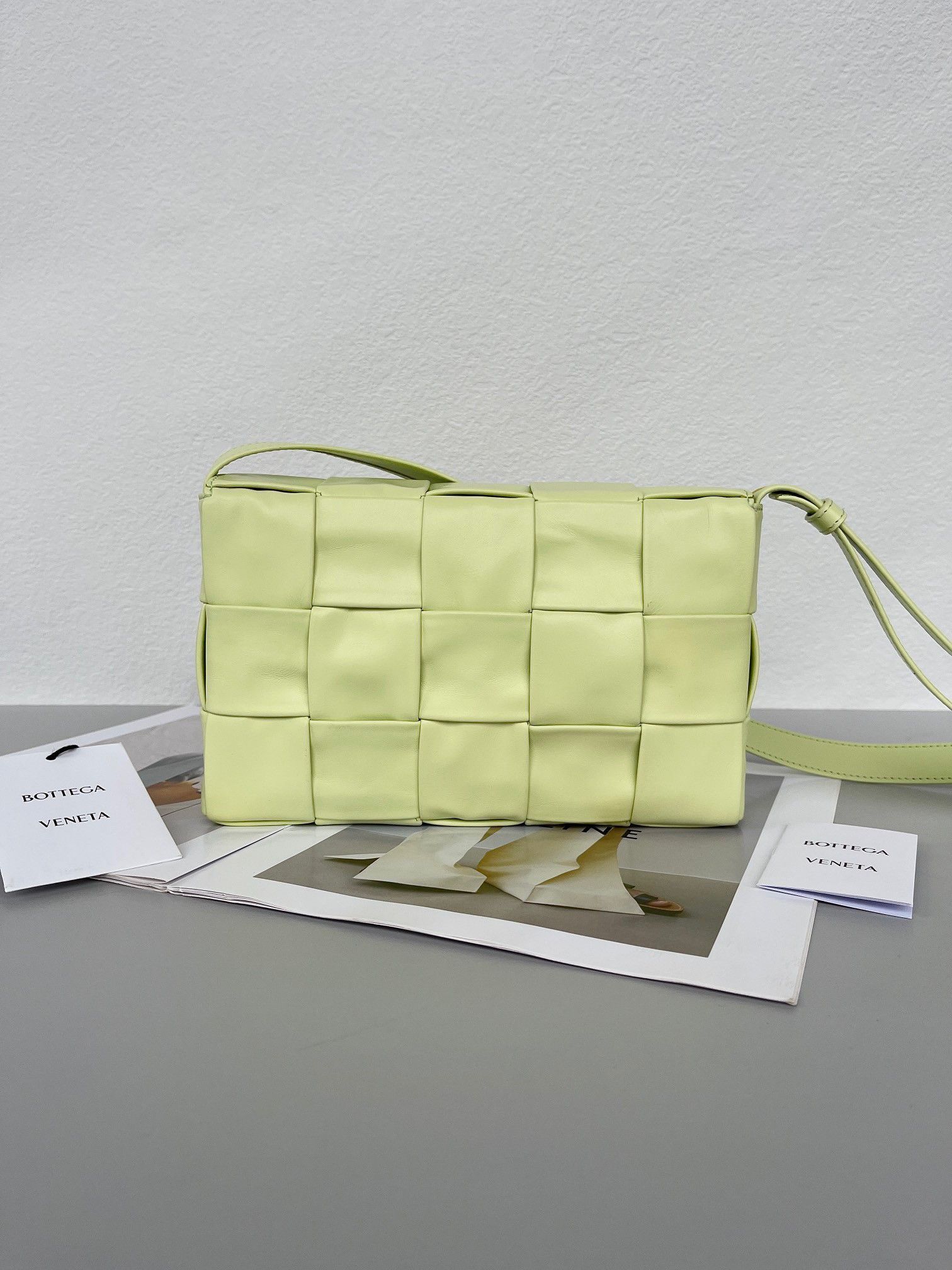 Bottega Veneta Cassette Bag In Lemon Washed Wrinkled Intreccio Calfskin