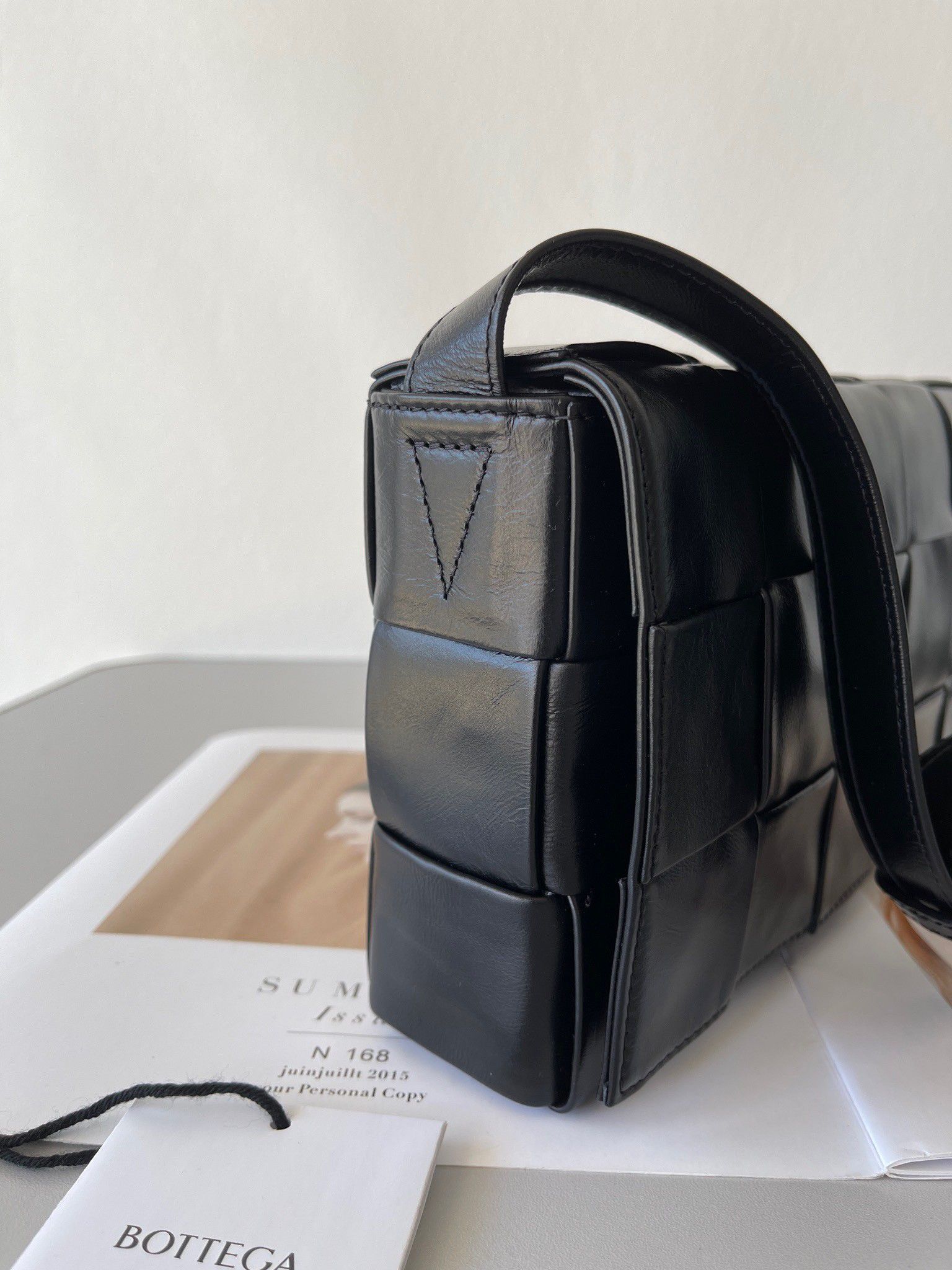 Bottega Veneta Cassette Bag In Black Wrinkled Intreccio Calfskin