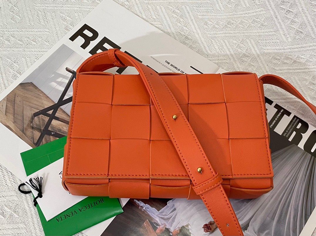 Bottega Veneta Cassette Bag In Orange Intreccio Lambskin