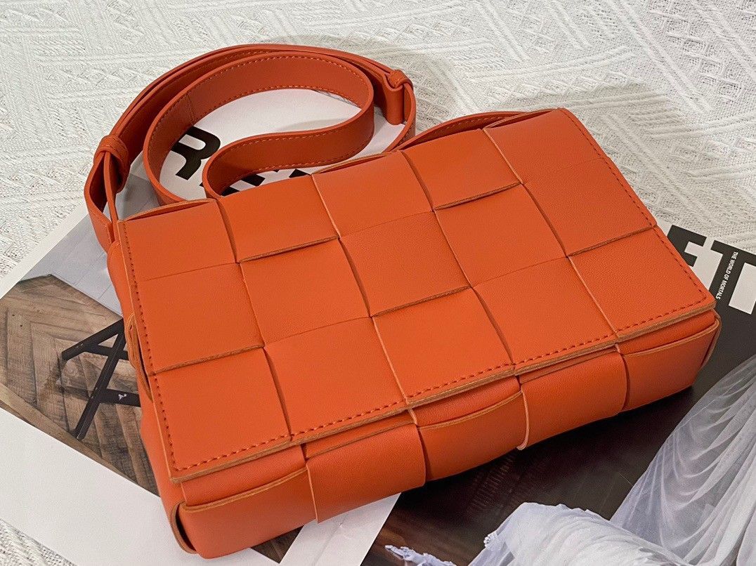 Bottega Veneta Cassette Bag In Orange Intreccio Lambskin