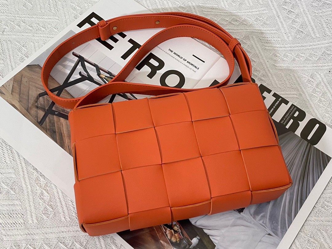 Bottega Veneta Cassette Bag In Orange Intreccio Lambskin