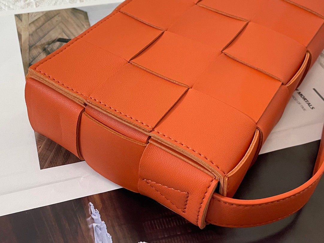 Bottega Veneta Cassette Bag In Orange Intreccio Lambskin