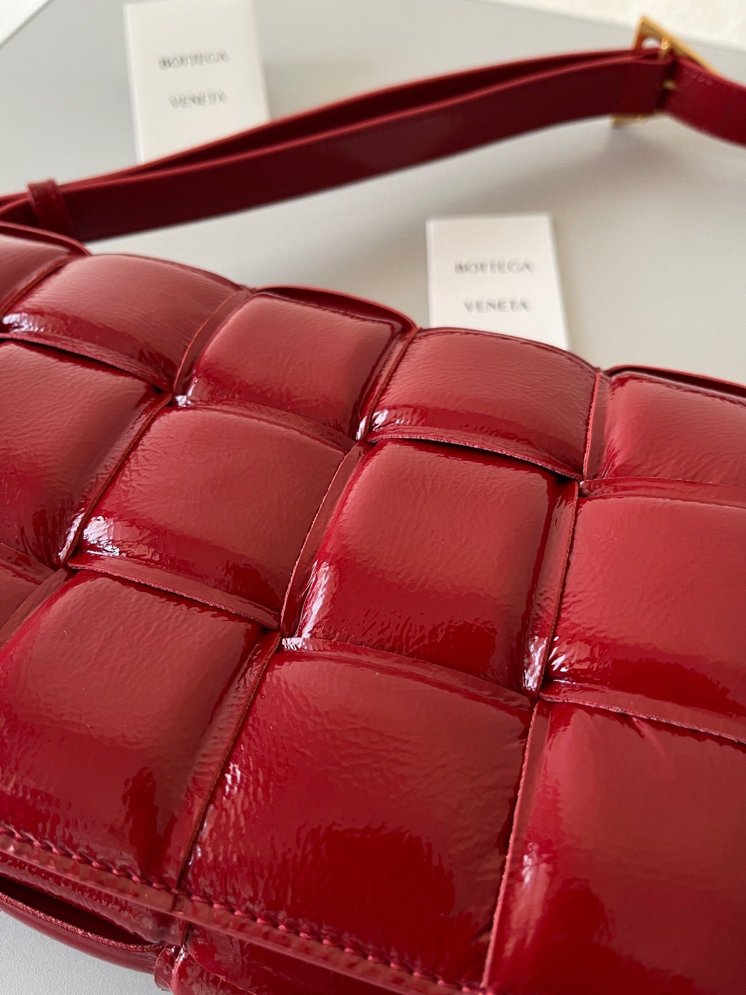 Bottega Veneta Padded Cassette Bag In Red Intrecciato Deerskin