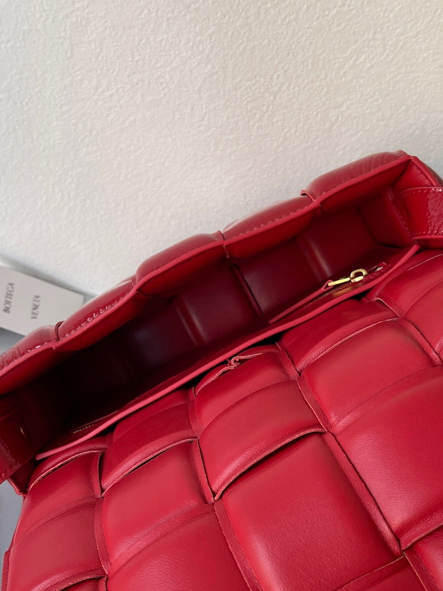 Bottega Veneta Padded Cassette Bag In Red Intrecciato Deerskin