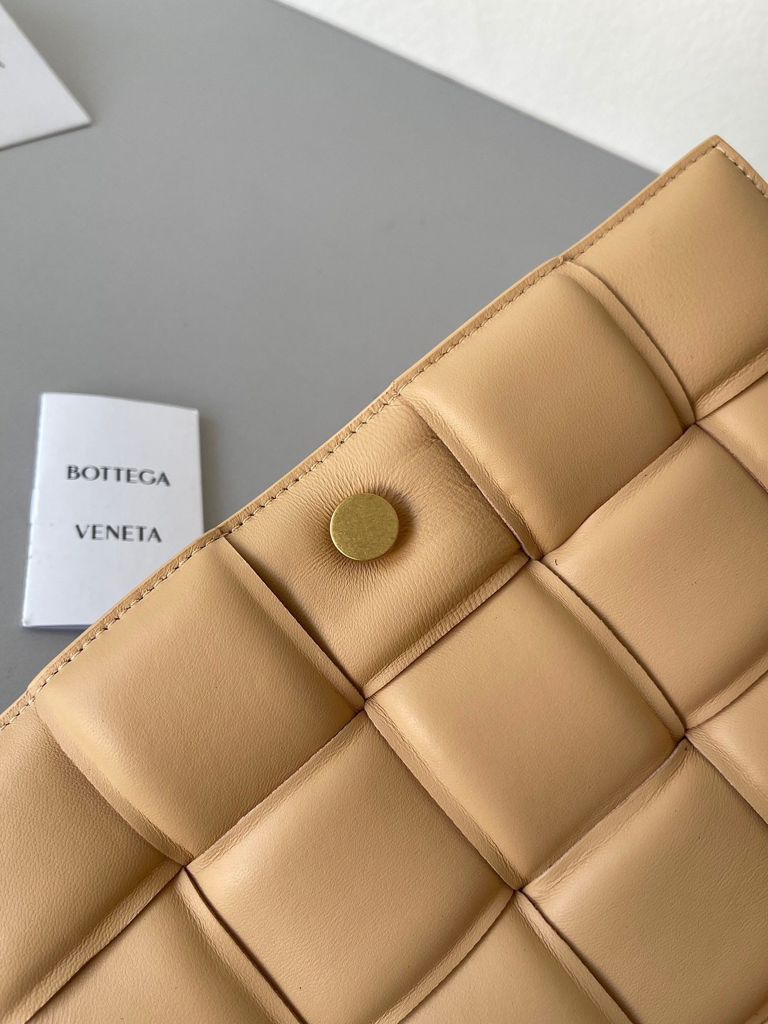 Bottega Veneta Padded Cassette Bag In Almond Intrecciato Lambskin