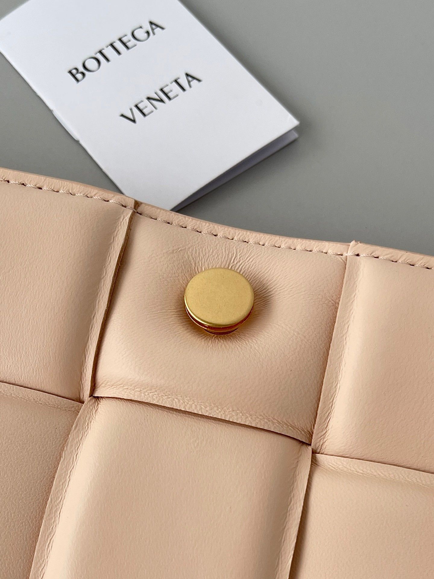 Bottega Veneta Padded Cassette Bag In Melon Intrecciato Lambskin