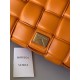 Bottega Veneta Padded Cassette Bag In Orange Intrecciato Lambskin