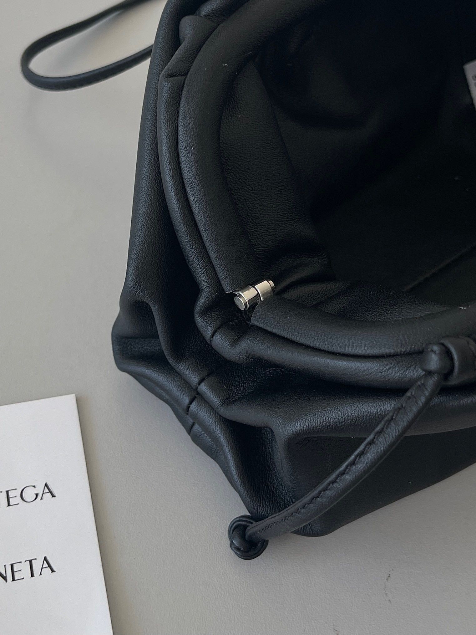 Bottega Veneta Mini Pouch with Strap in Black Calfskin