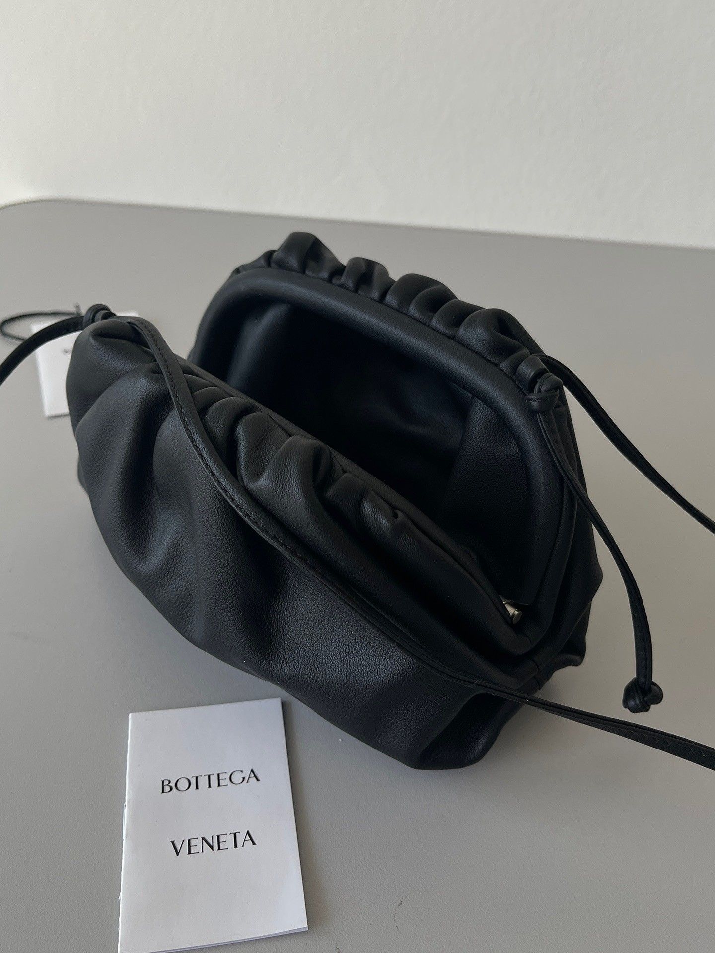 Bottega Veneta Mini Pouch with Strap in Black Calfskin