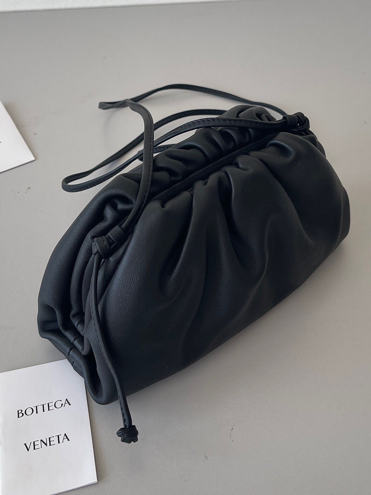 Bottega Veneta Mini Pouch with Strap in Black Calfskin