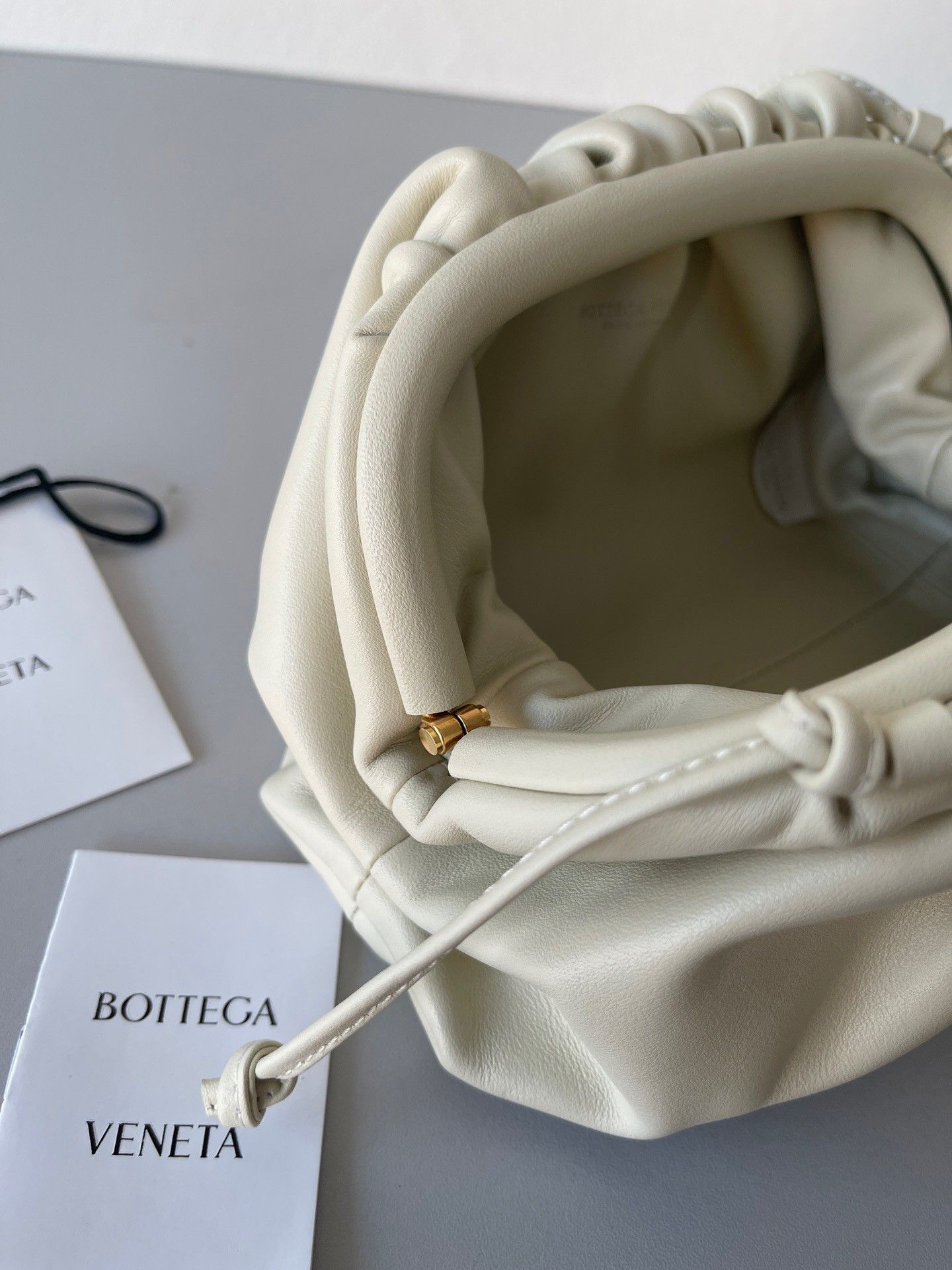 Bottega Veneta Mini Pouch with Strap in Ivory Calfskin