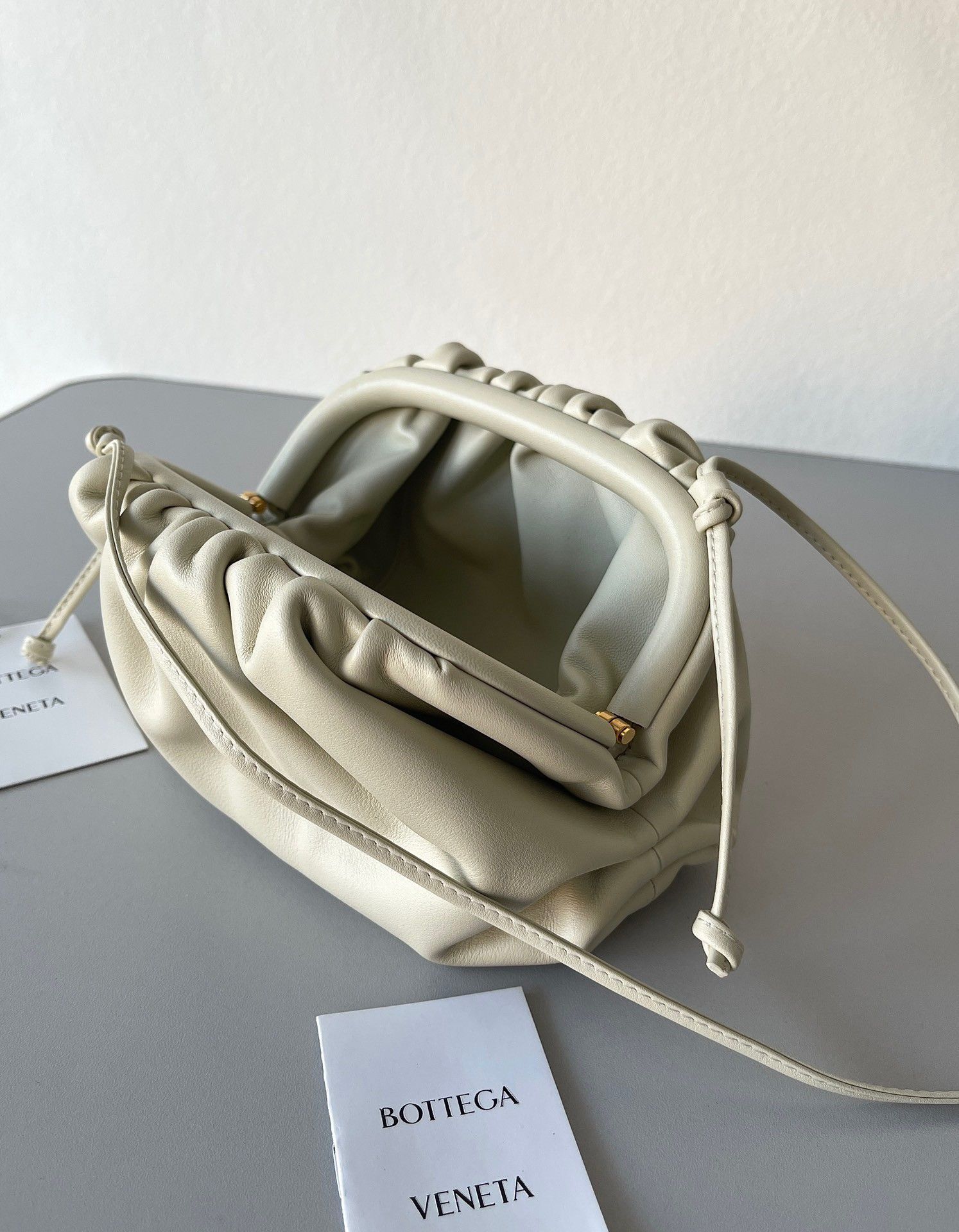 Bottega Veneta Mini Pouch with Strap in Ivory Calfskin