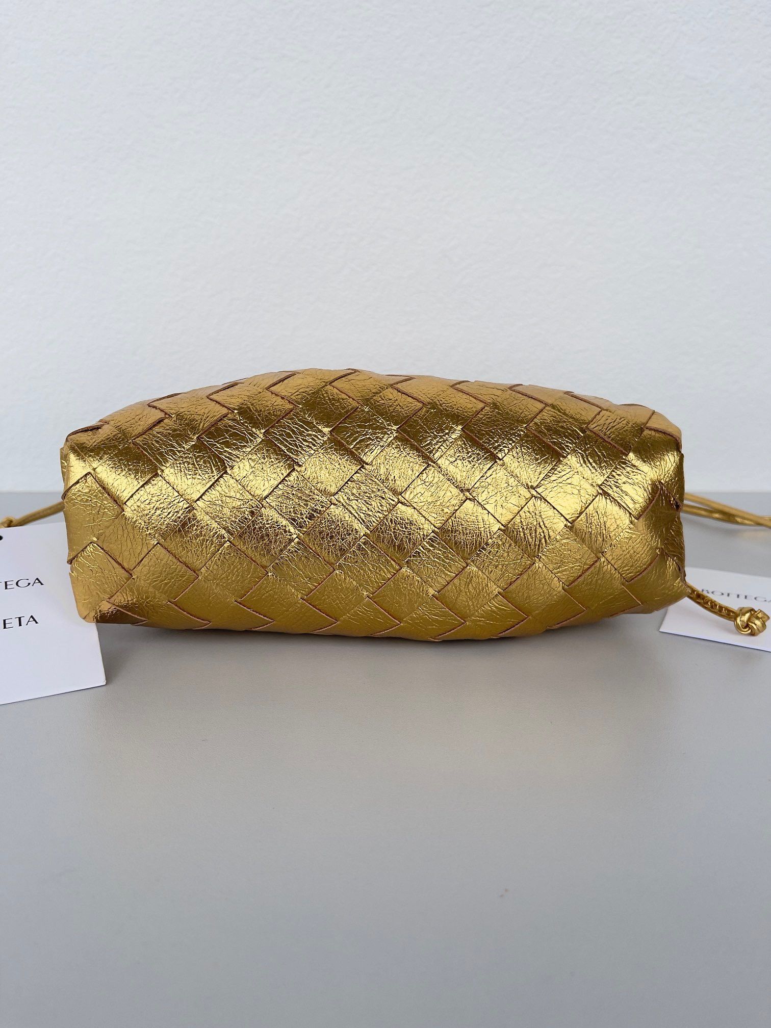 Bottega Veneta Mini Pouch with Strap in Gold Metallic Lambskin