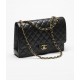 CHANEL Maxi Classic Handbag Black Grained Calfskin Gold Tone Metal