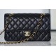 CHANEL Maxi Classic Handbag Black Grained Calfskin Gold Tone Metal