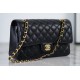 CHANEL Maxi Classic Handbag Black Grained Calfskin Gold Tone Metal