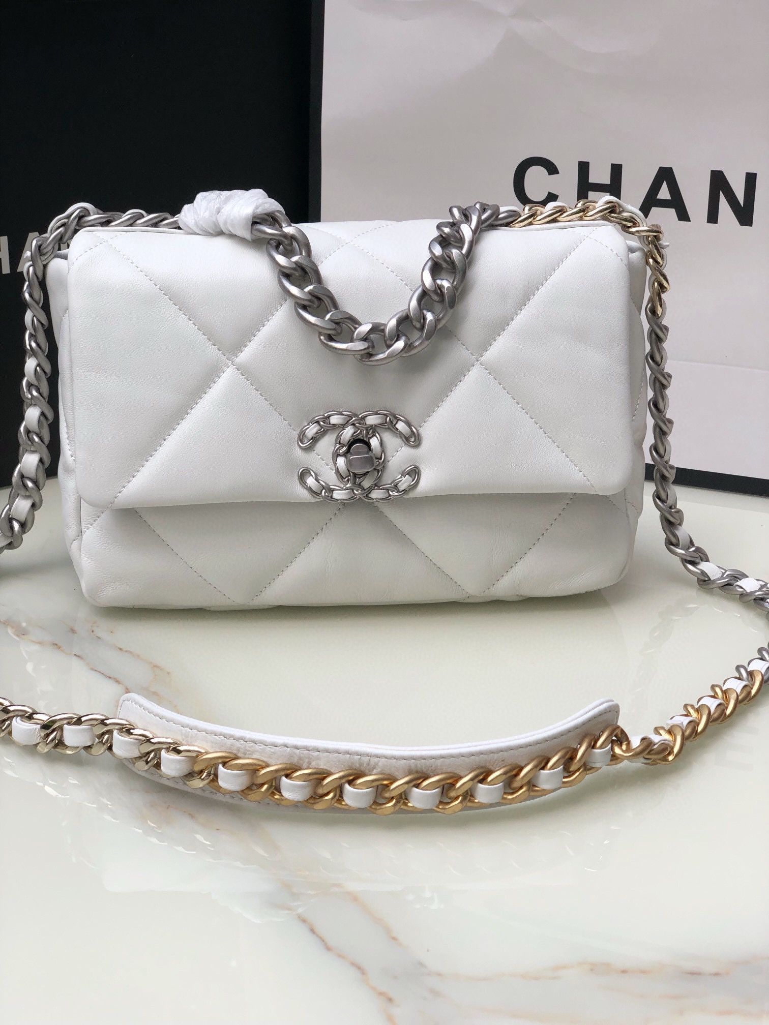 CHANEL 19 Handbag White Shiny Lambskin Gold Tone Silver Tone Ruthenium Finish Metal