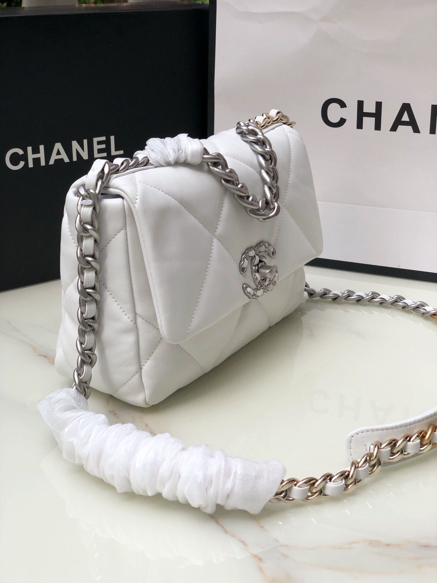 CHANEL 19 Handbag White Shiny Lambskin Gold Tone Silver Tone Ruthenium Finish Metal