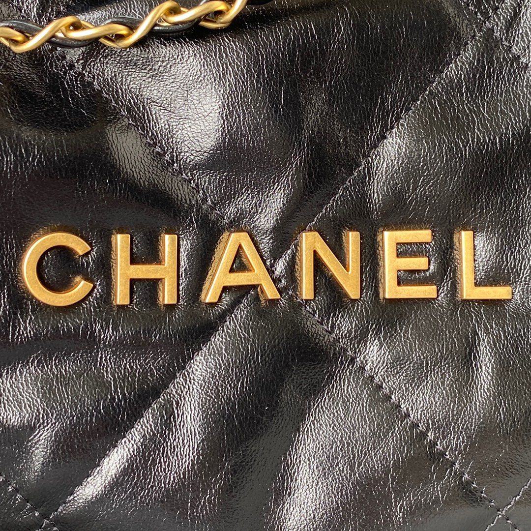 CHANEL 22 Handbag Black Shiny Calfskin Gold Tone Metal