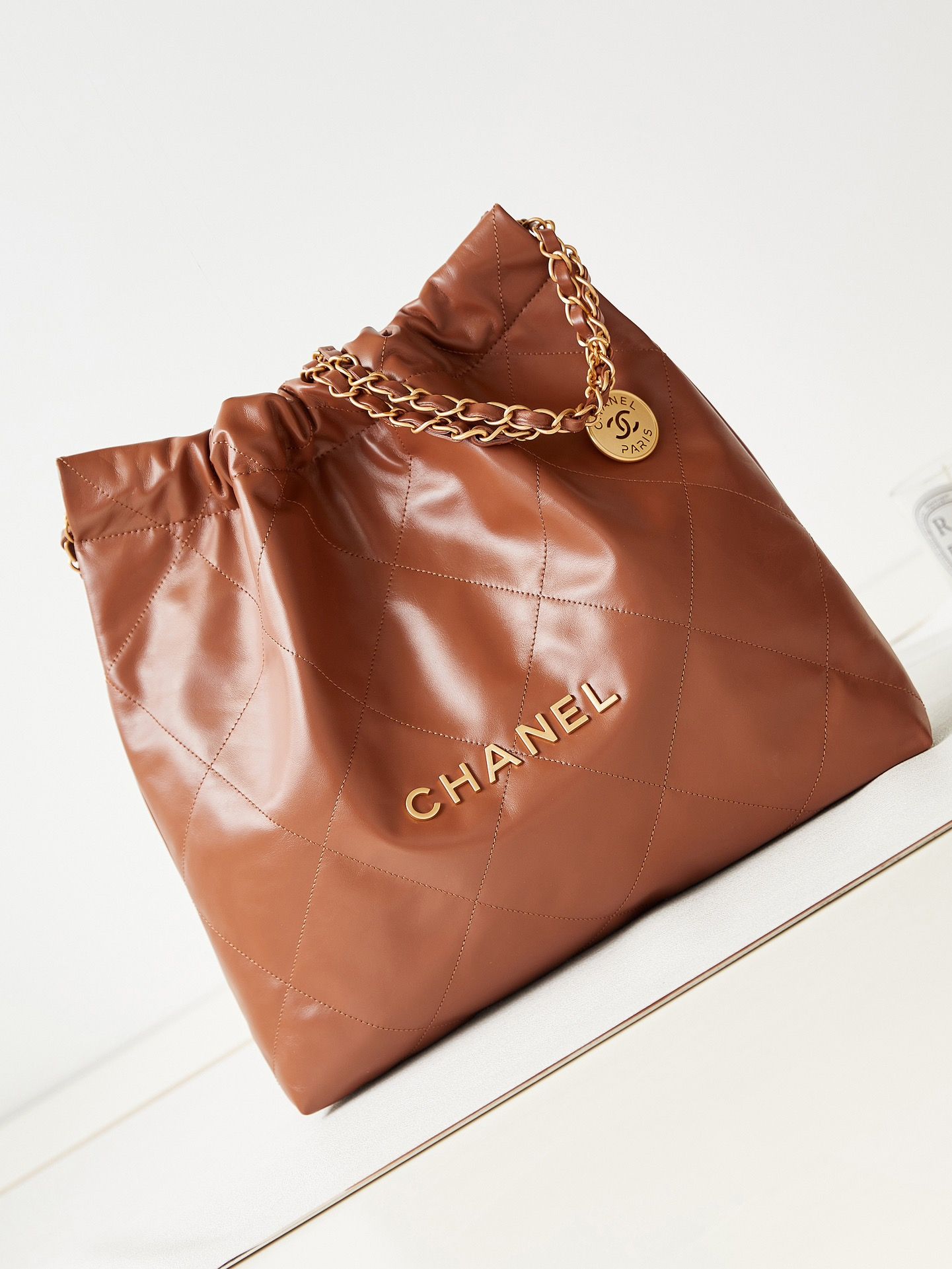 CHANEL 22 Handbag Camel Shiny Calfskin Gold Tone Metal