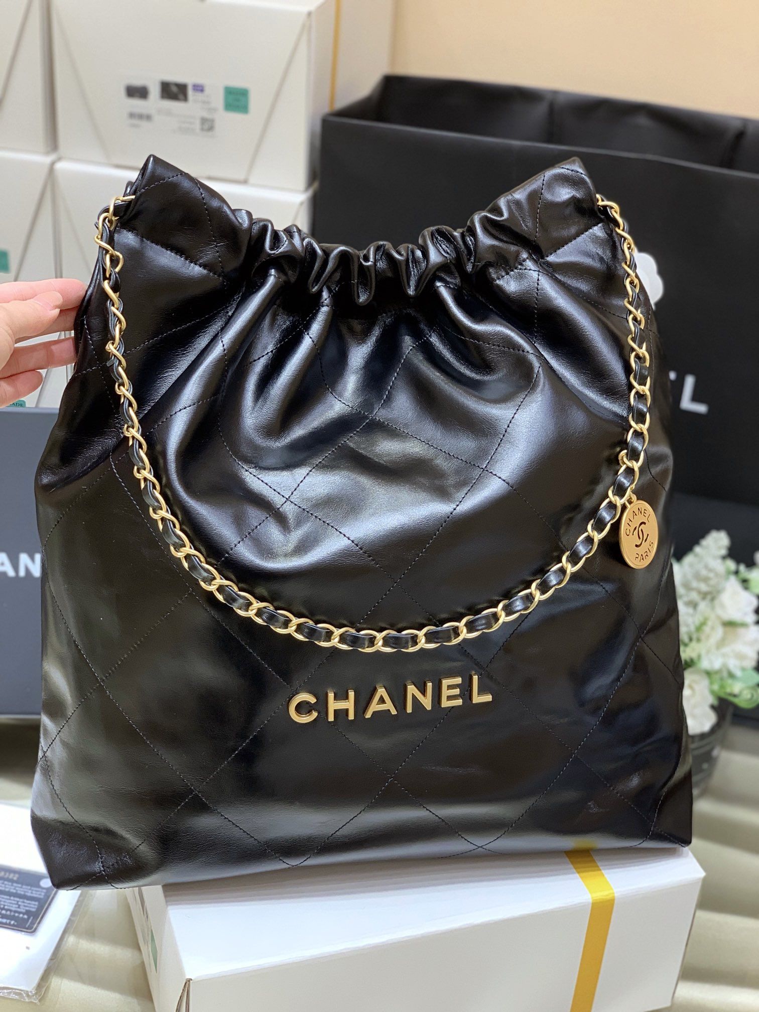 CHANEL 22 Large Handbag Black Shiny Calfskin Gold Tone Metal