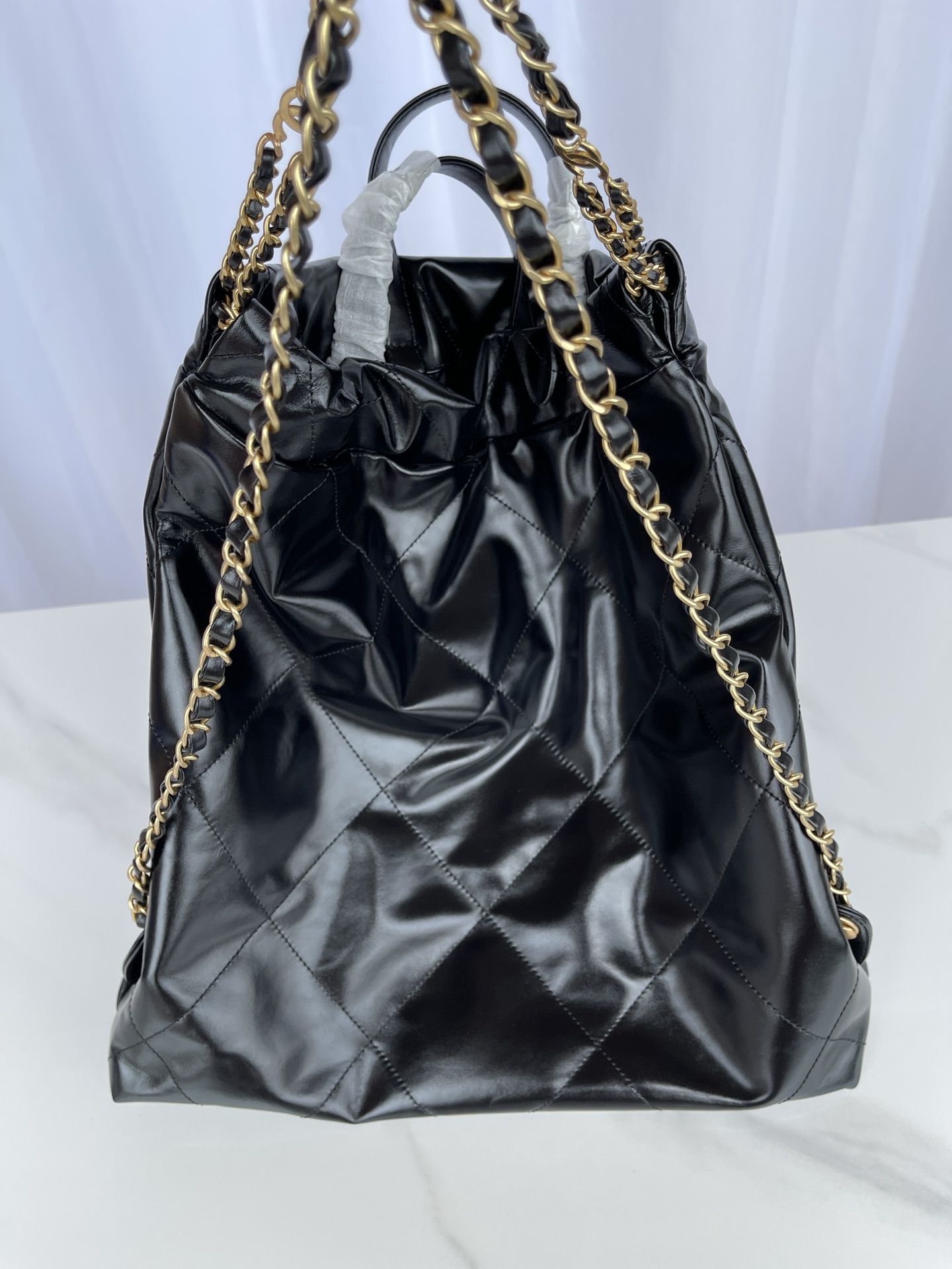 CHANEL Large Back Pack CHANEL 22 Black Shiny Calfskin Gold Tone Metal