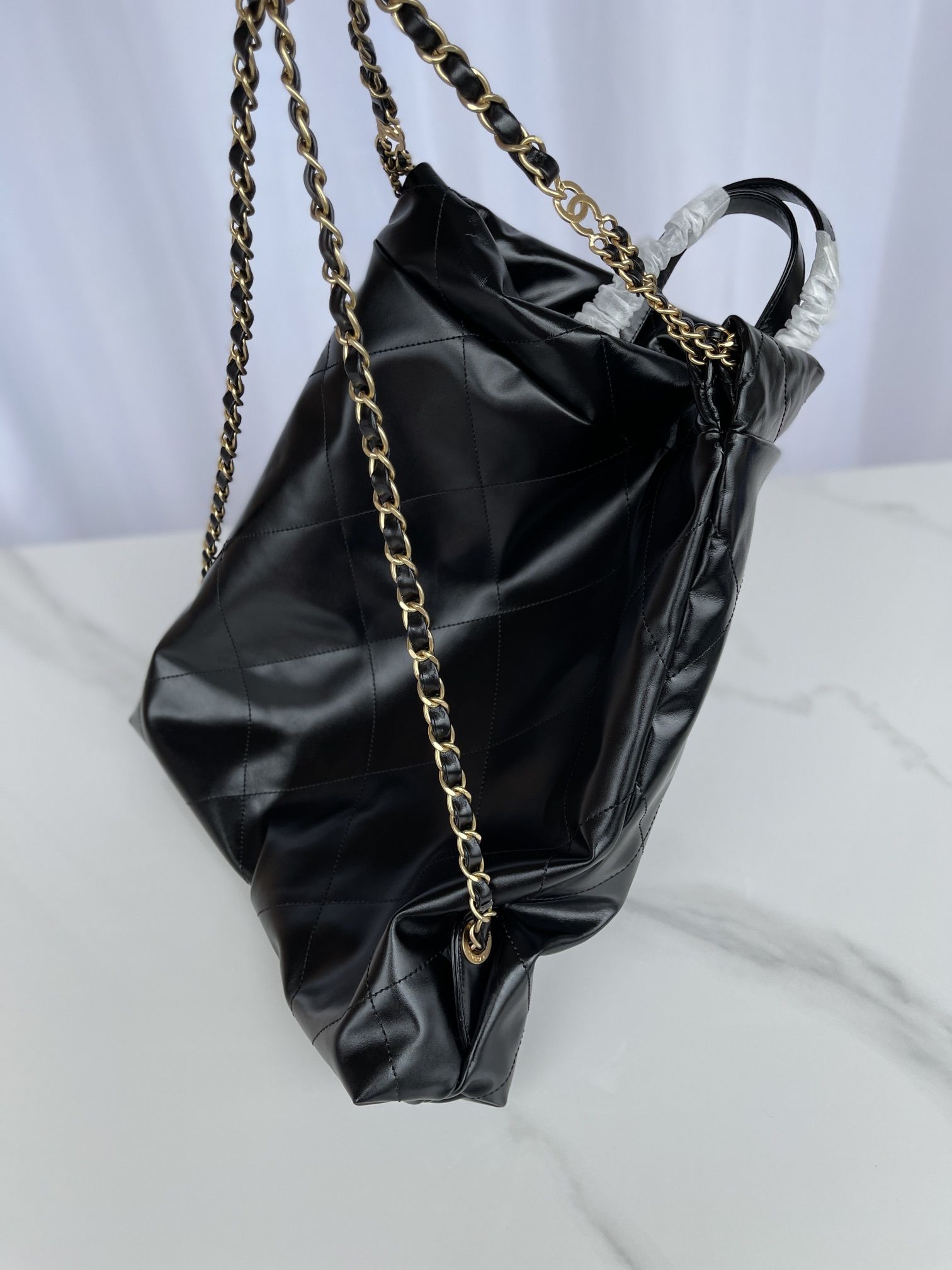 CHANEL Large Back Pack CHANEL 22 Black Shiny Calfskin Gold Tone Metal