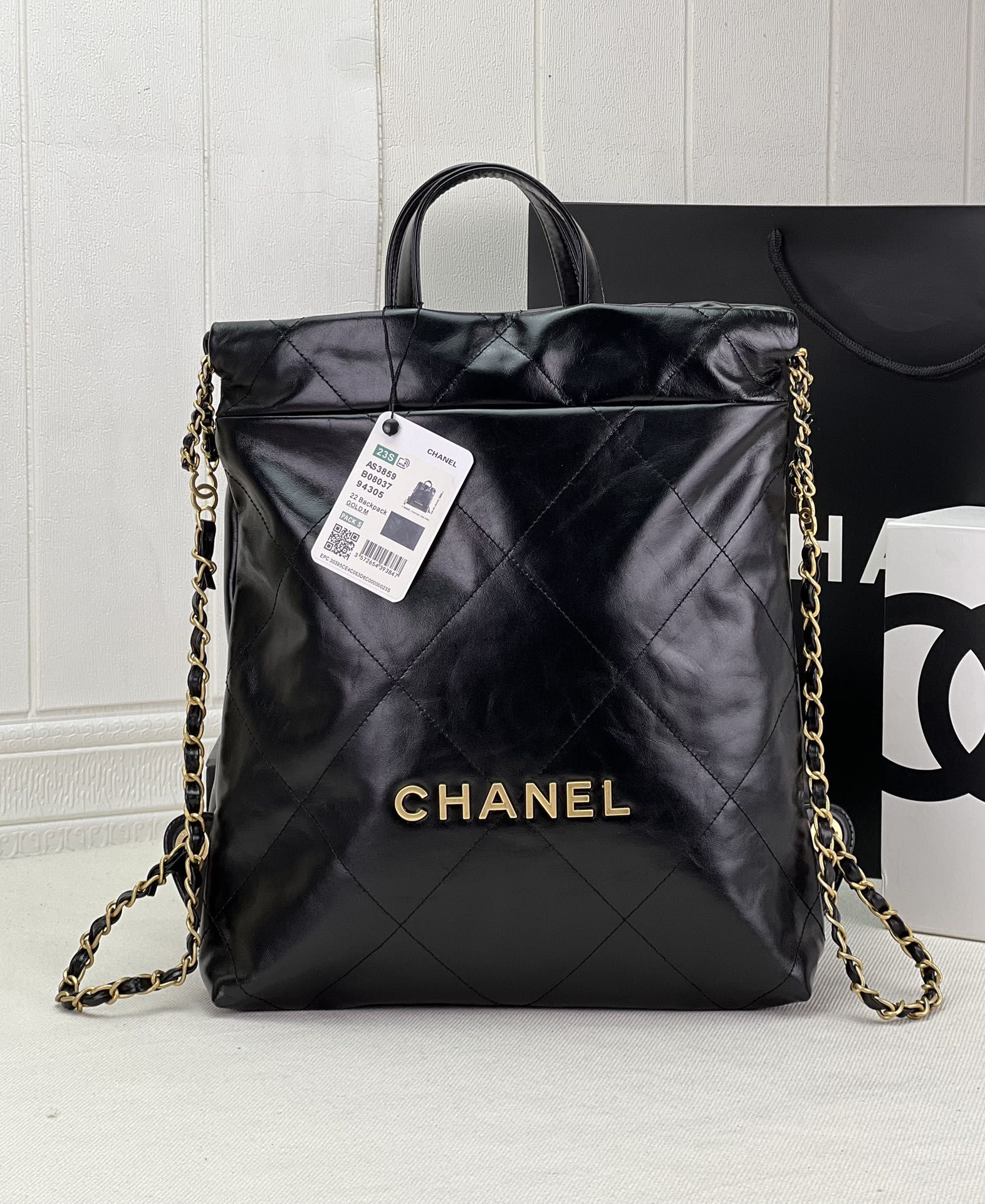 CHANEL 22 Backpack Black Shiny Calfskin Gold Tone Metal