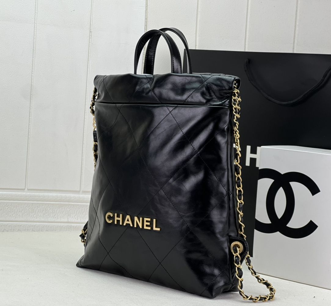 CHANEL 22 Backpack Black Shiny Calfskin Gold Tone Metal