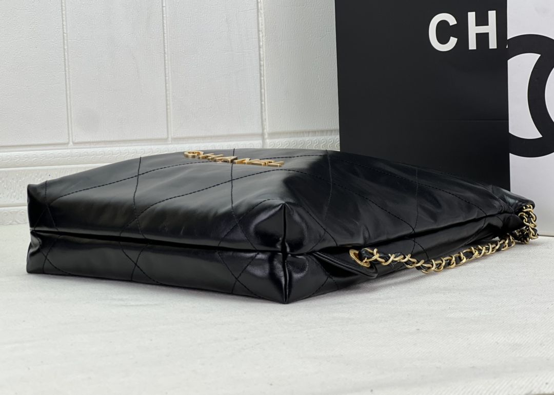 CHANEL 22 Backpack Black Shiny Calfskin Gold Tone Metal