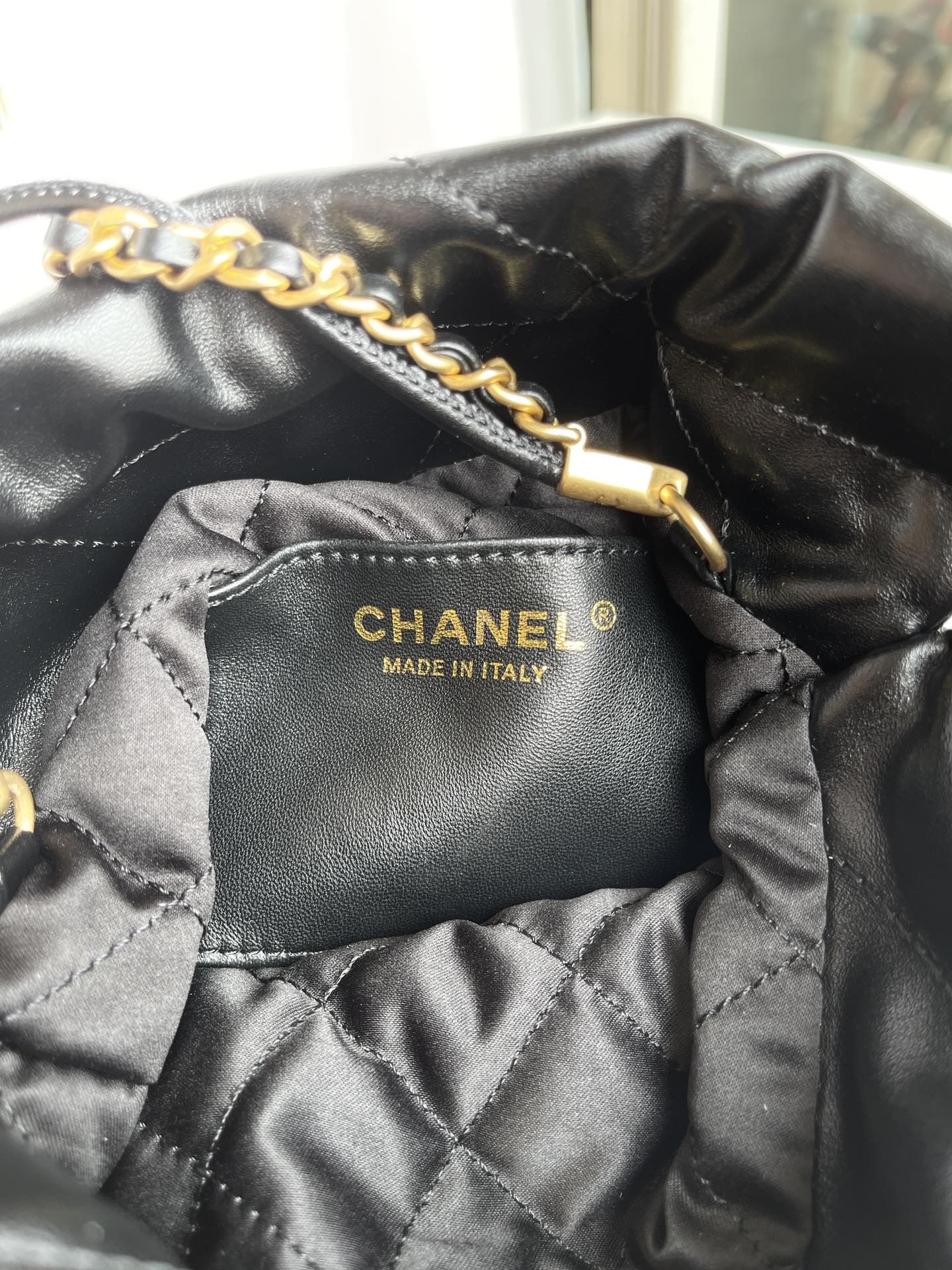 CHANEL 22 Mini Handbag Black Calfskin Gold Tone Lacquered Metal