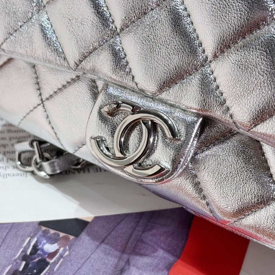 CHANEL Backpack Silver Metallic Lambskin Silver Tone Metal