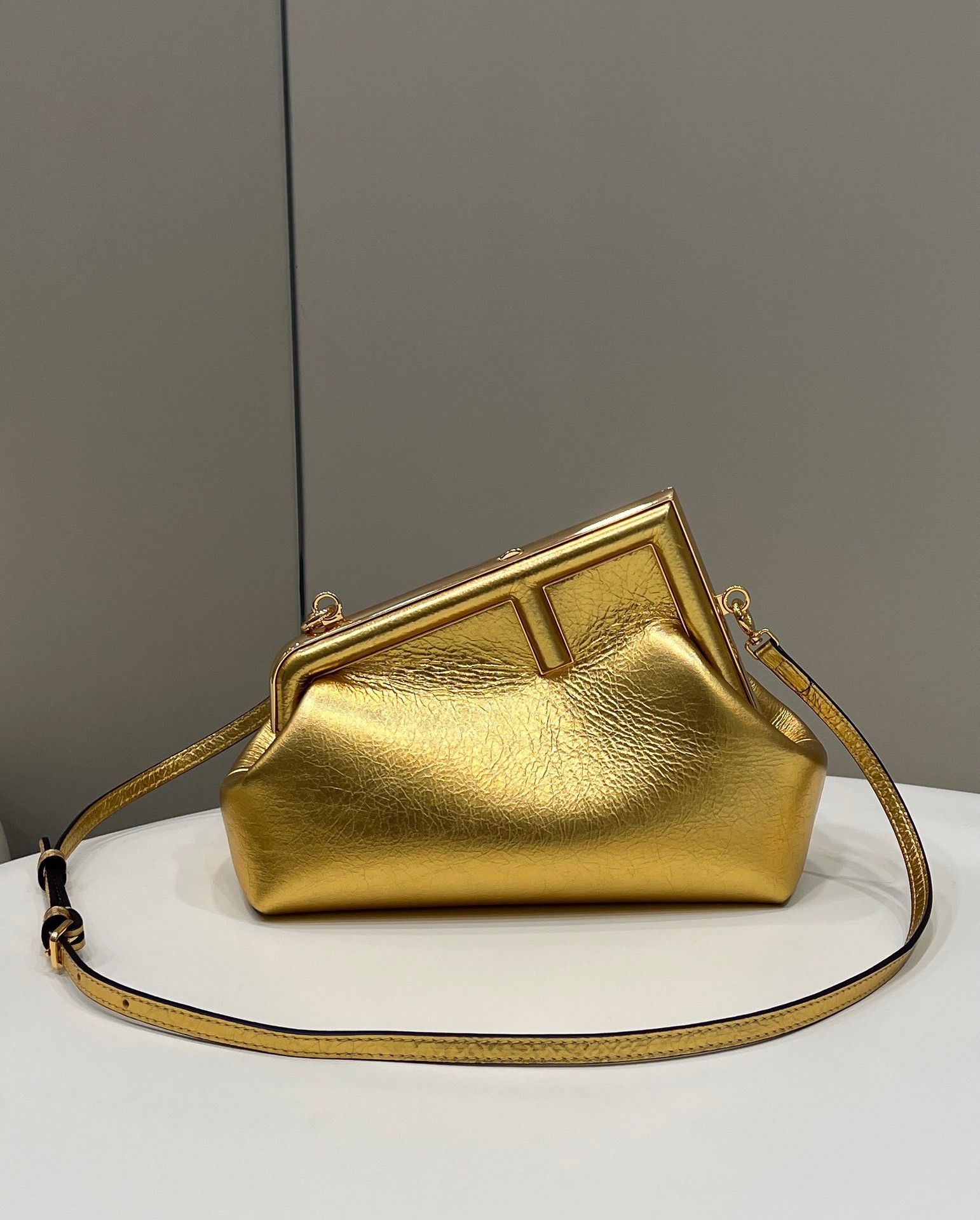 Fendi First Small Bag In Gold Laminated Leather