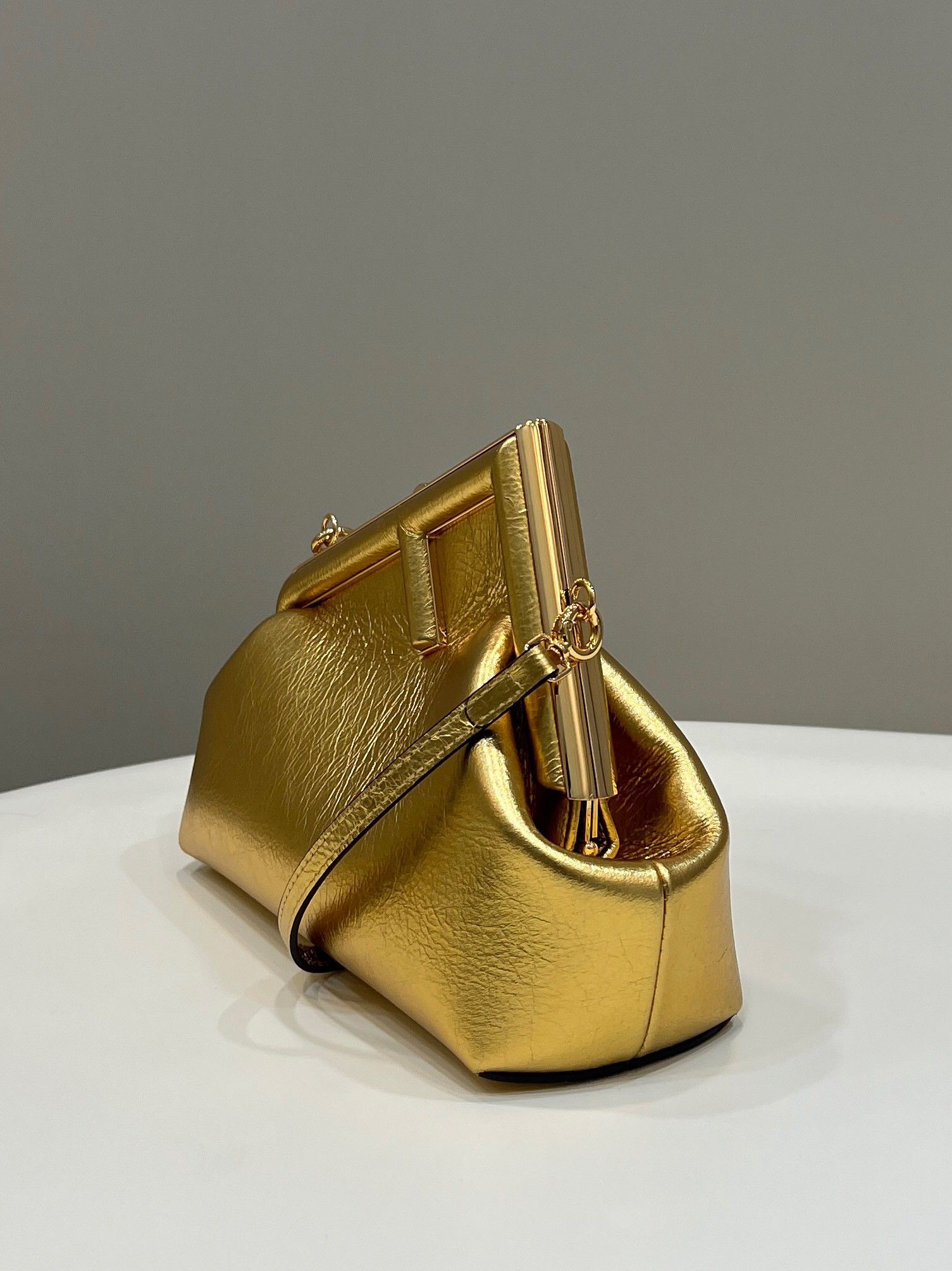 Fendi First Small Bag In Gold Laminated Leather