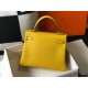 Hermes Kelly 25cm Retourne Bag in Jaune Ambre Clemence Leather GHW