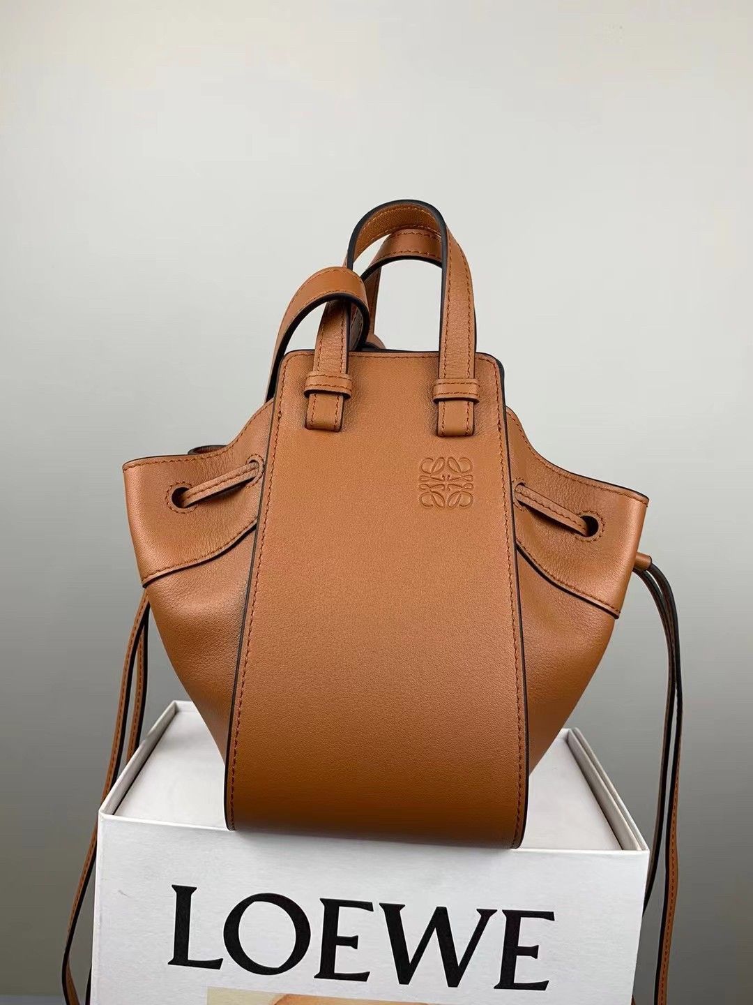 Loewe Mini Hammock Drawstring Bag In Brown Calfskin