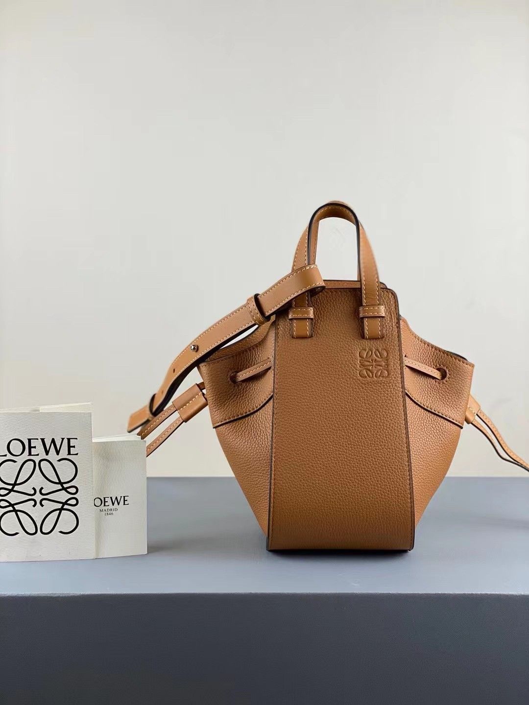 Loewe Mini Hammock Drawstring Bag In Brown Grained Leather