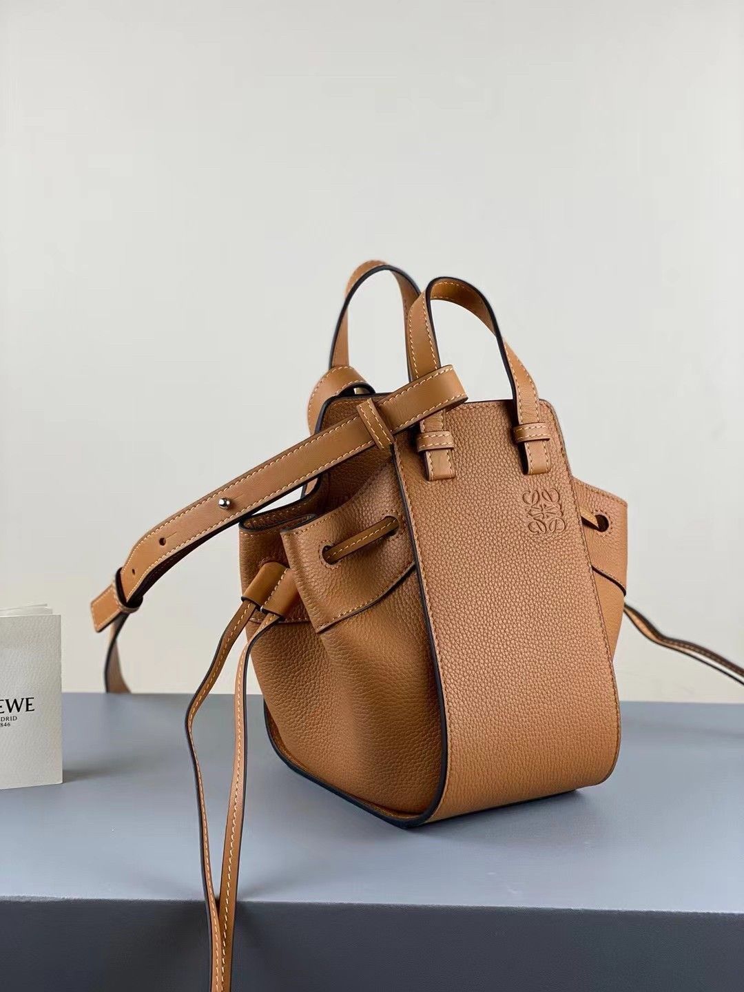 Loewe Mini Hammock Drawstring Bag In Brown Grained Leather