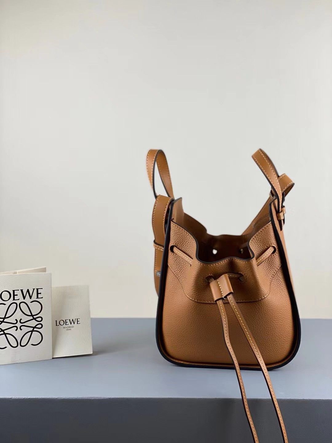 Loewe Mini Hammock Drawstring Bag In Brown Grained Leather