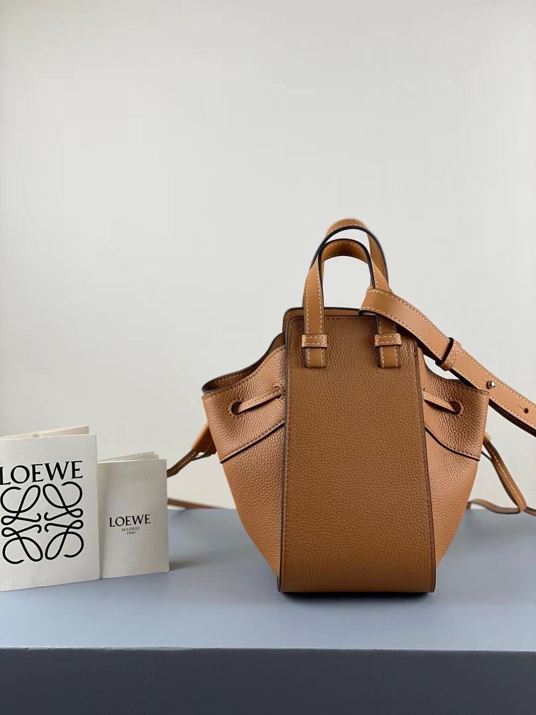 Loewe Mini Hammock Drawstring Bag In Brown Grained Leather