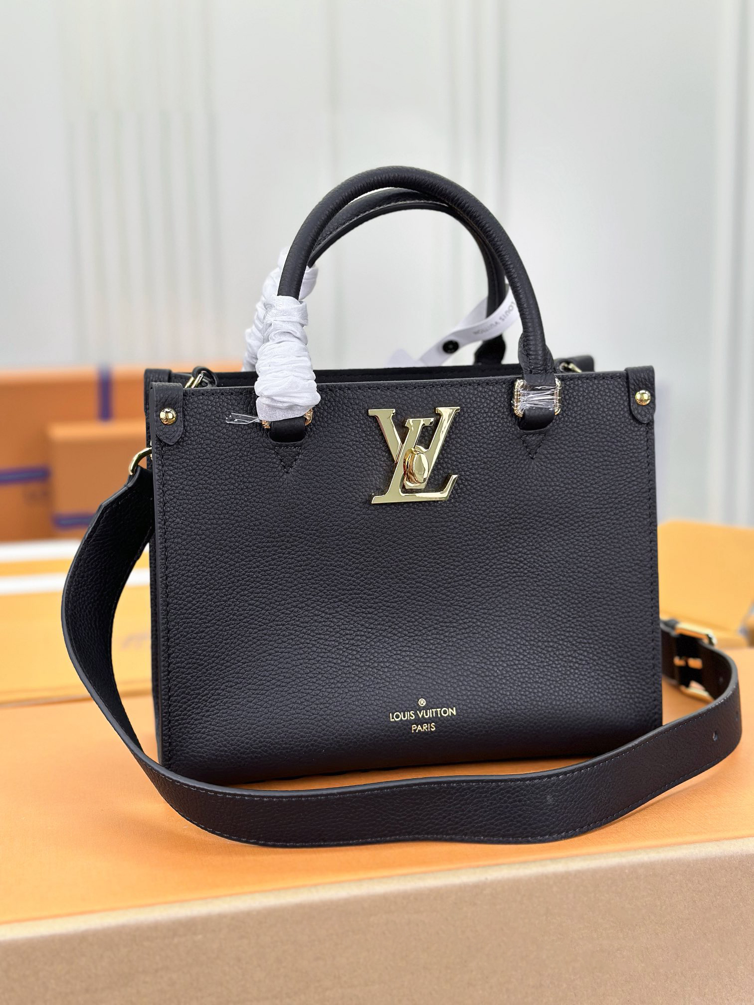 Louis Vuitton Lock & Go Lockme Leather Handbags M22311