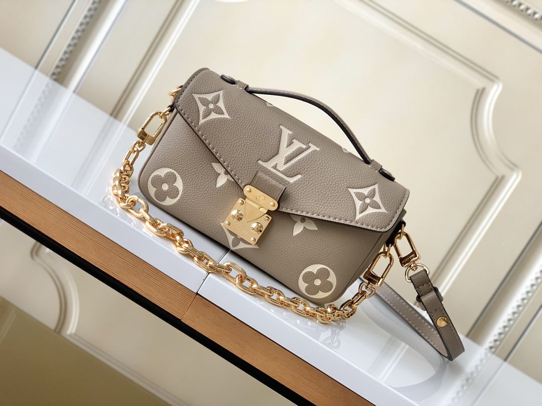 Louis Vuitton Pochette Métis East West Monogram Empreinte Leather Women's Handbags M23081