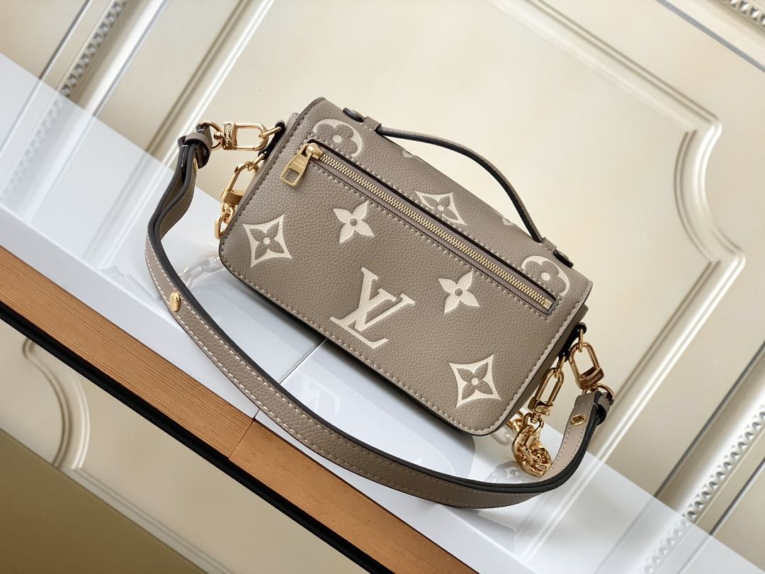 Louis Vuitton Pochette Métis East West Monogram Empreinte Leather Women's Handbags M23081