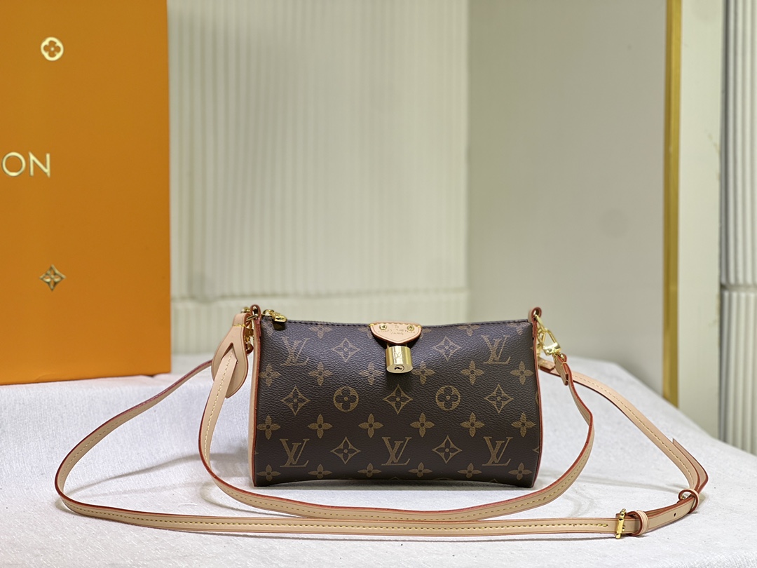 Louis Vuitton Pochette Tirette Monogram Canvas Handbag