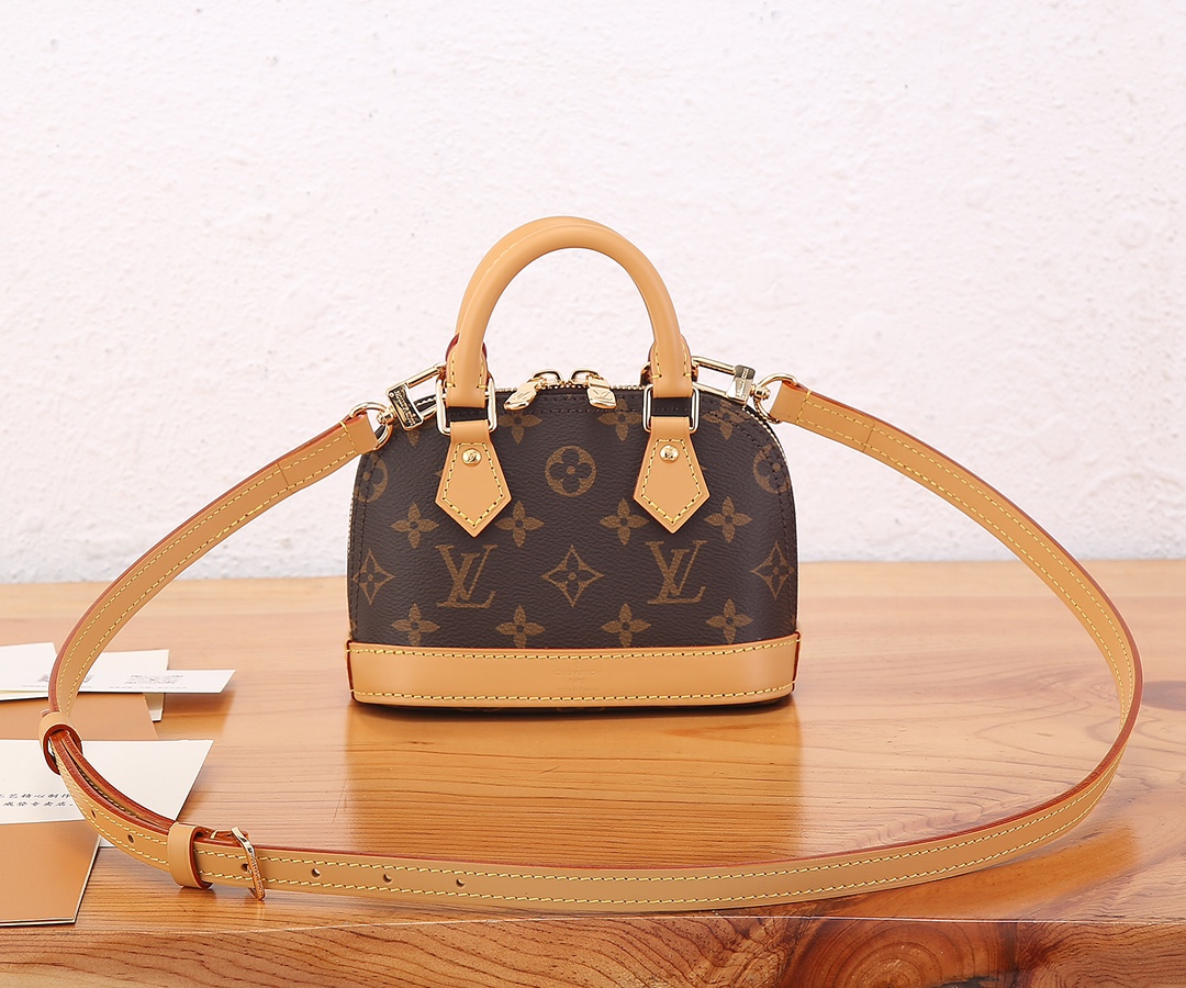 Louis Vuitton Nano Alma Monogram Canvas Handbag