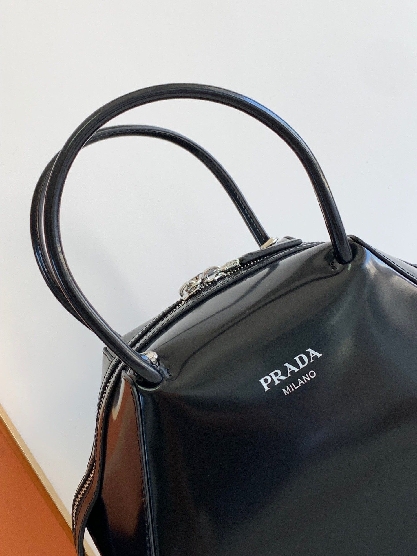 Prada Supernova Small Top Handle Bag In Black Brushed Leather