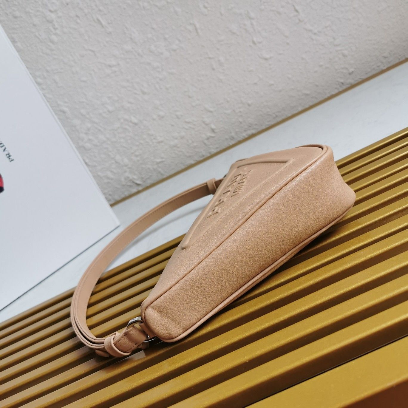 Prada Triangle Pouch Bag In Beige Calfskin