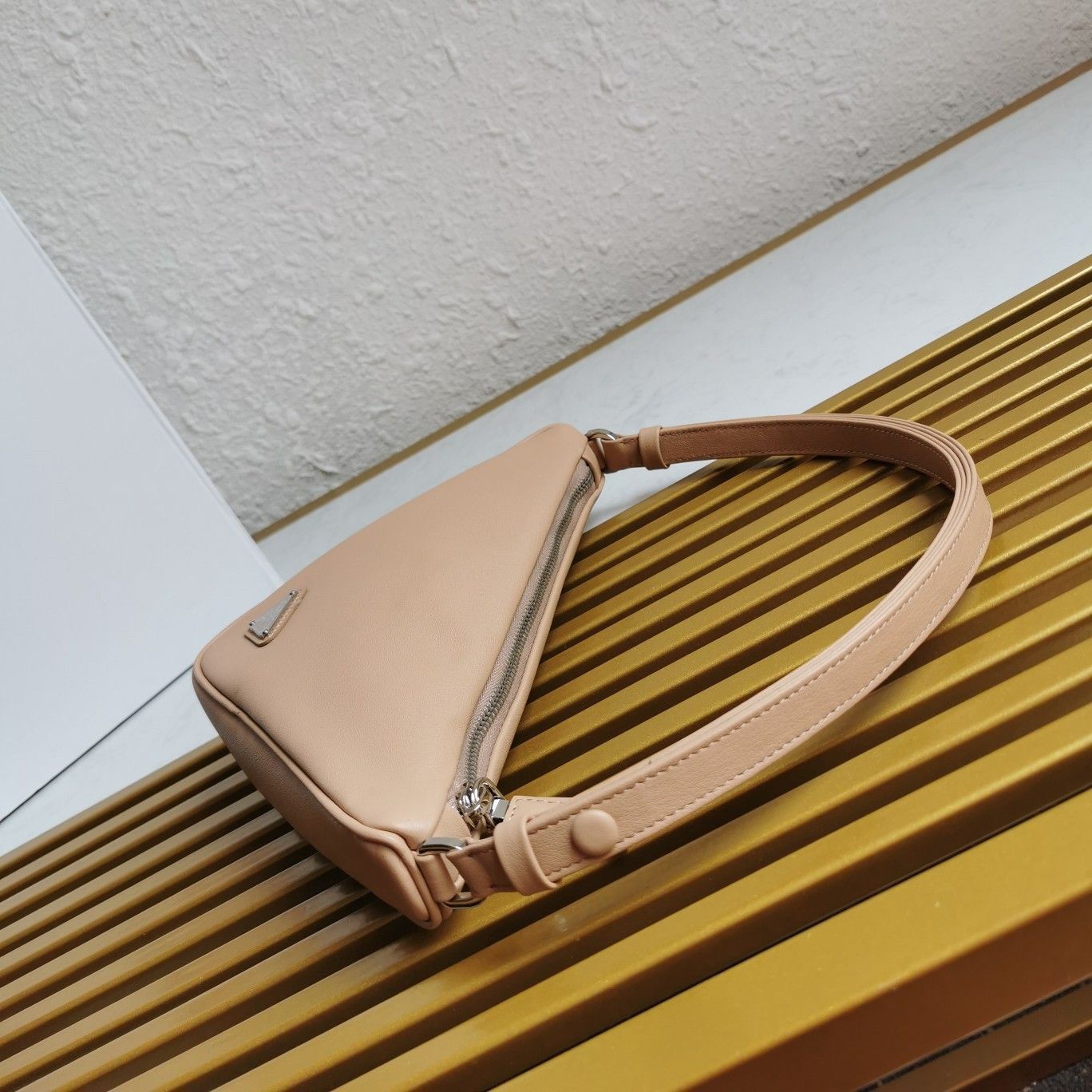 Prada Triangle Pouch Bag In Beige Calfskin