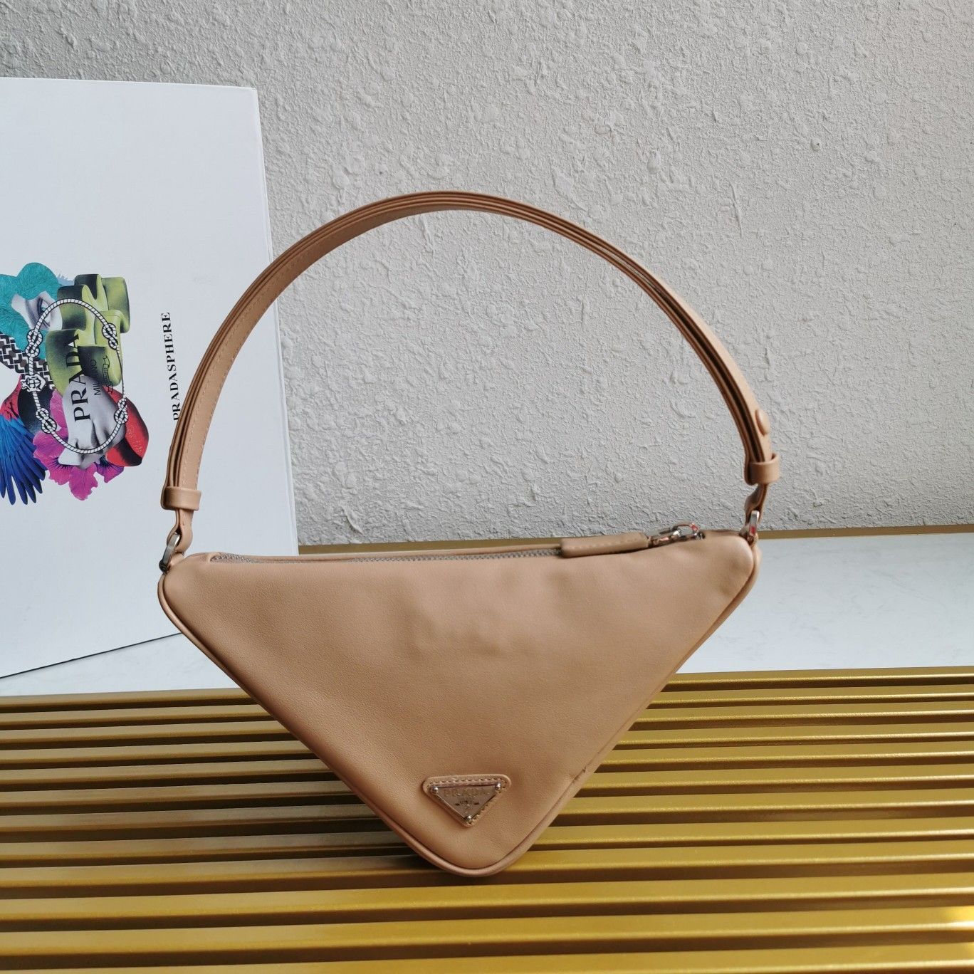 Prada Triangle Pouch Bag In Beige Calfskin